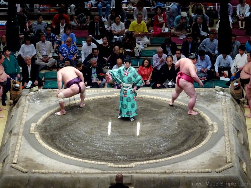 sumo tournament Tokyo Japan intimidation rituals